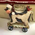 Christmas Cow on Wheels
